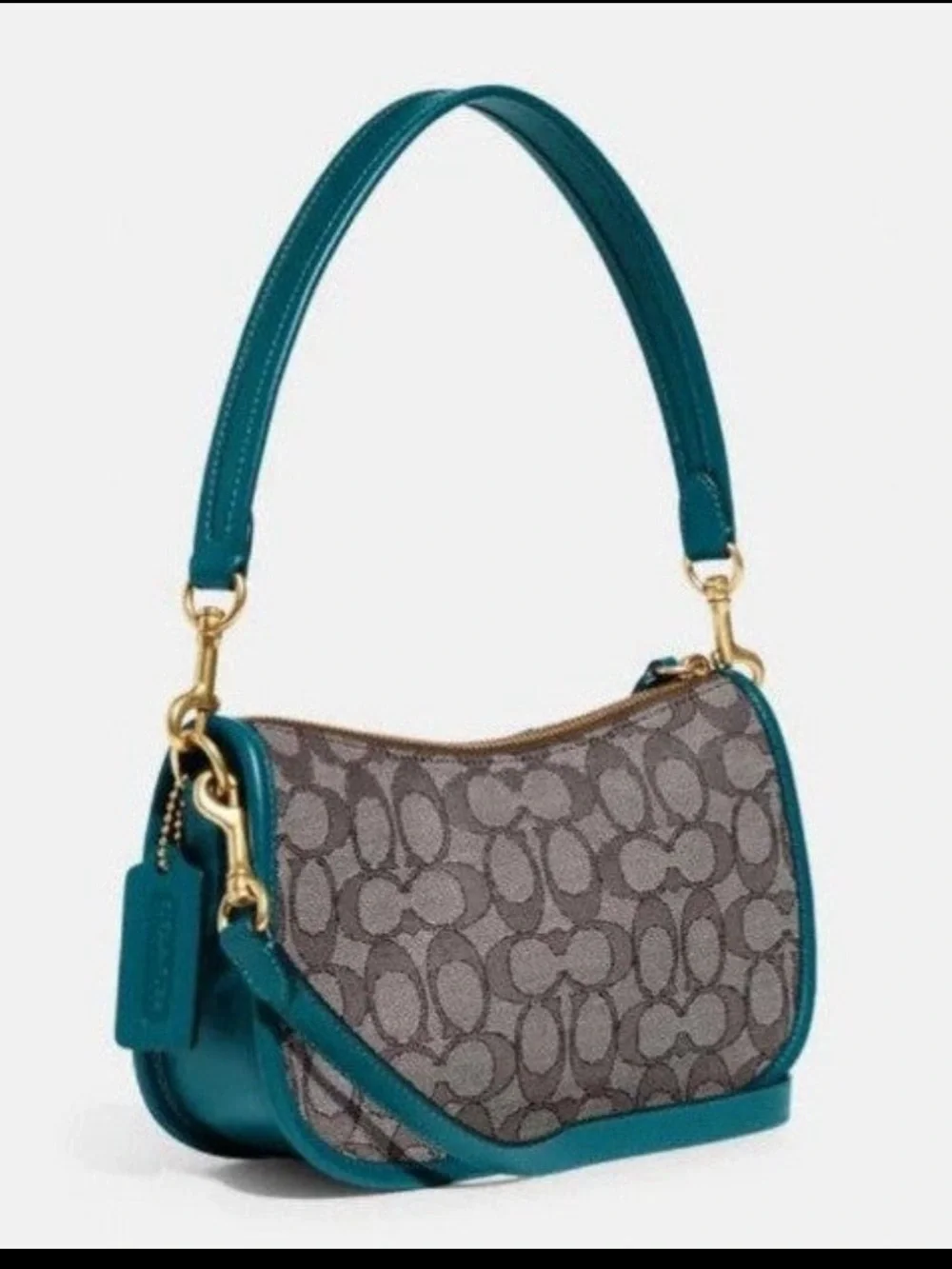 Coach Swinger in Sinature jacquard Teal soft leather and  brownSignature-Pattern
